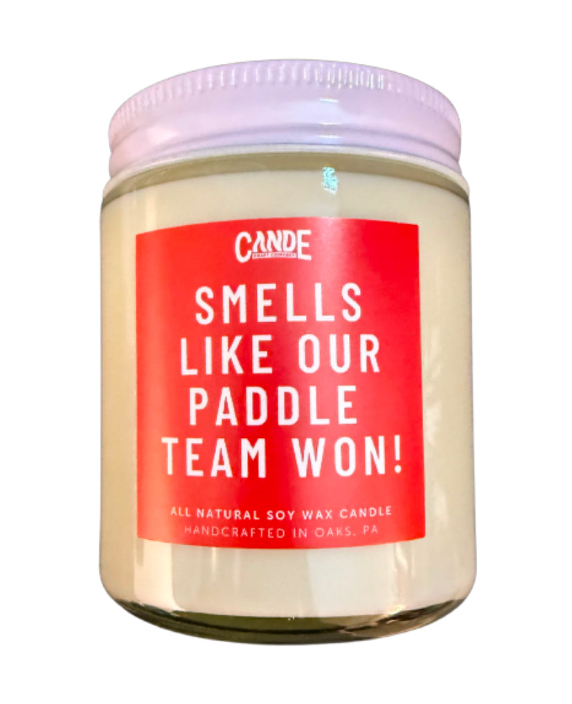 “Smells like our paddle team won!” candle