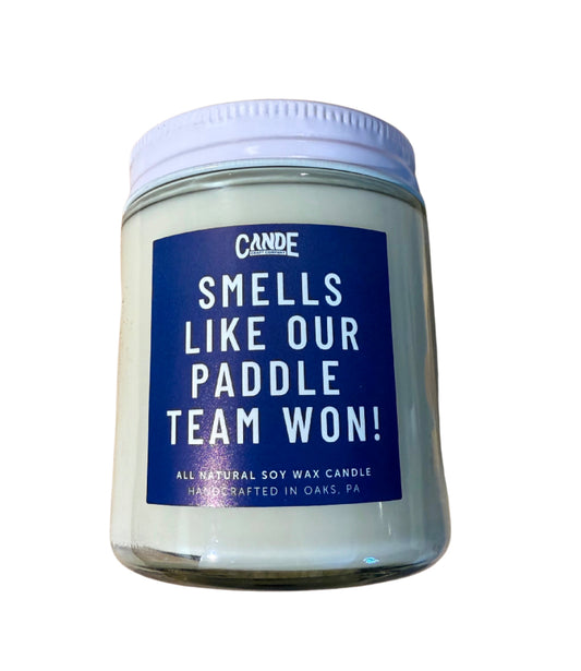 “Smells like our paddle team won!” candle