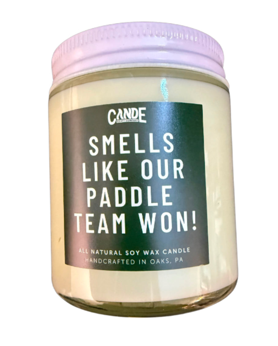 “Smells like our paddle team won!” candle