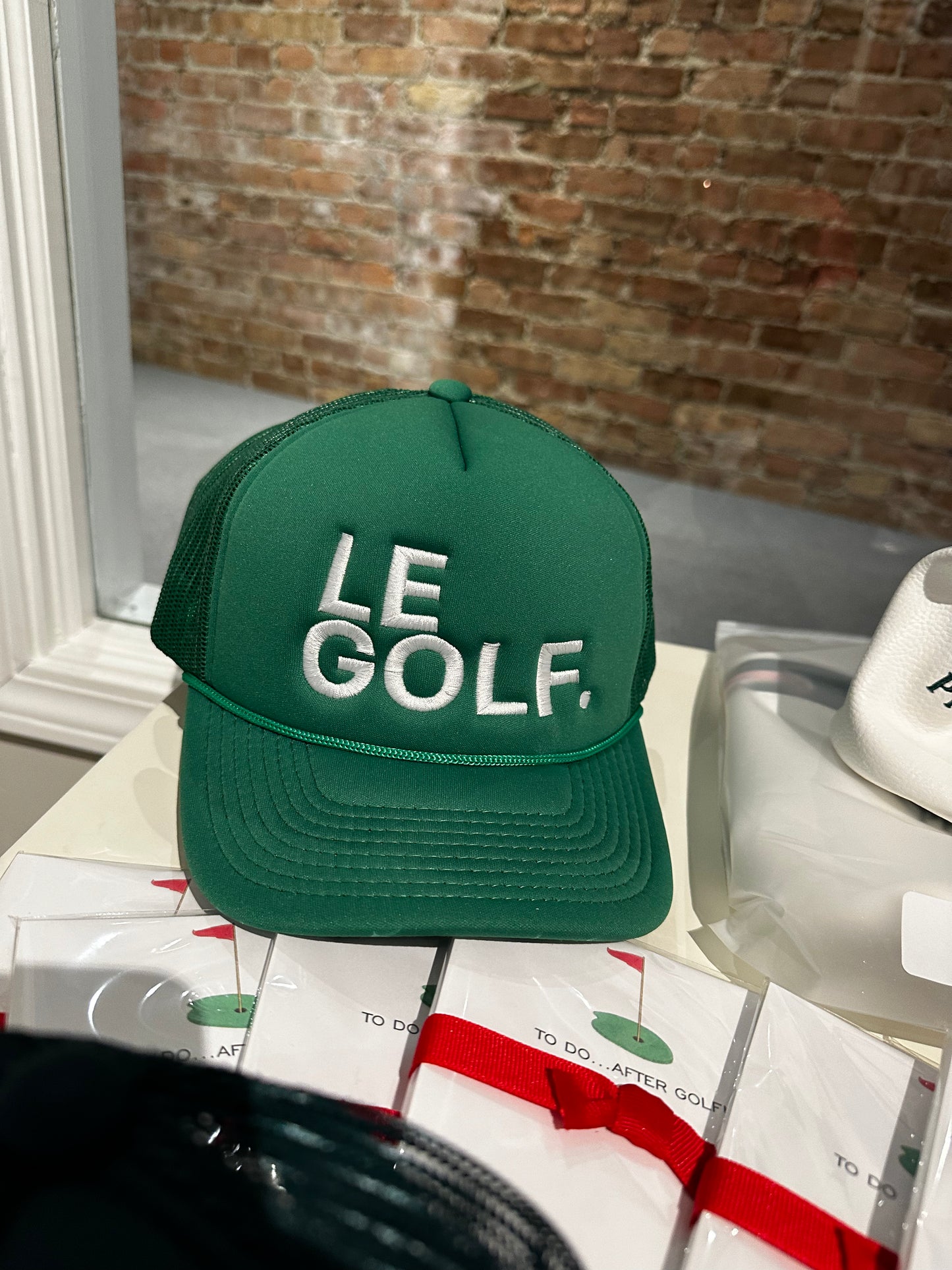 Le Golf Trucker Hat