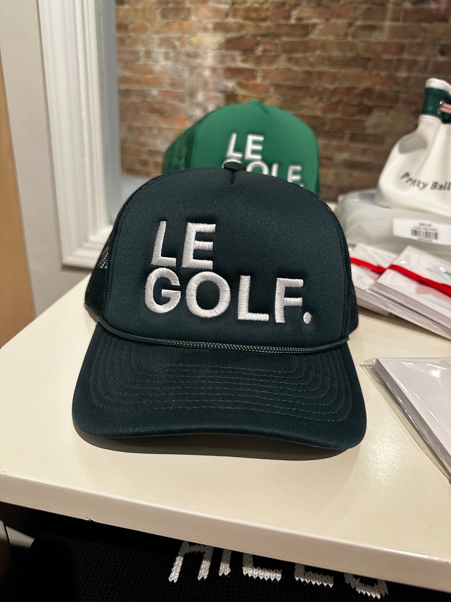 Le Golf Trucker Hat